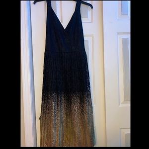 A black and gold dress by Worthington in size 14. Barley ever worn.